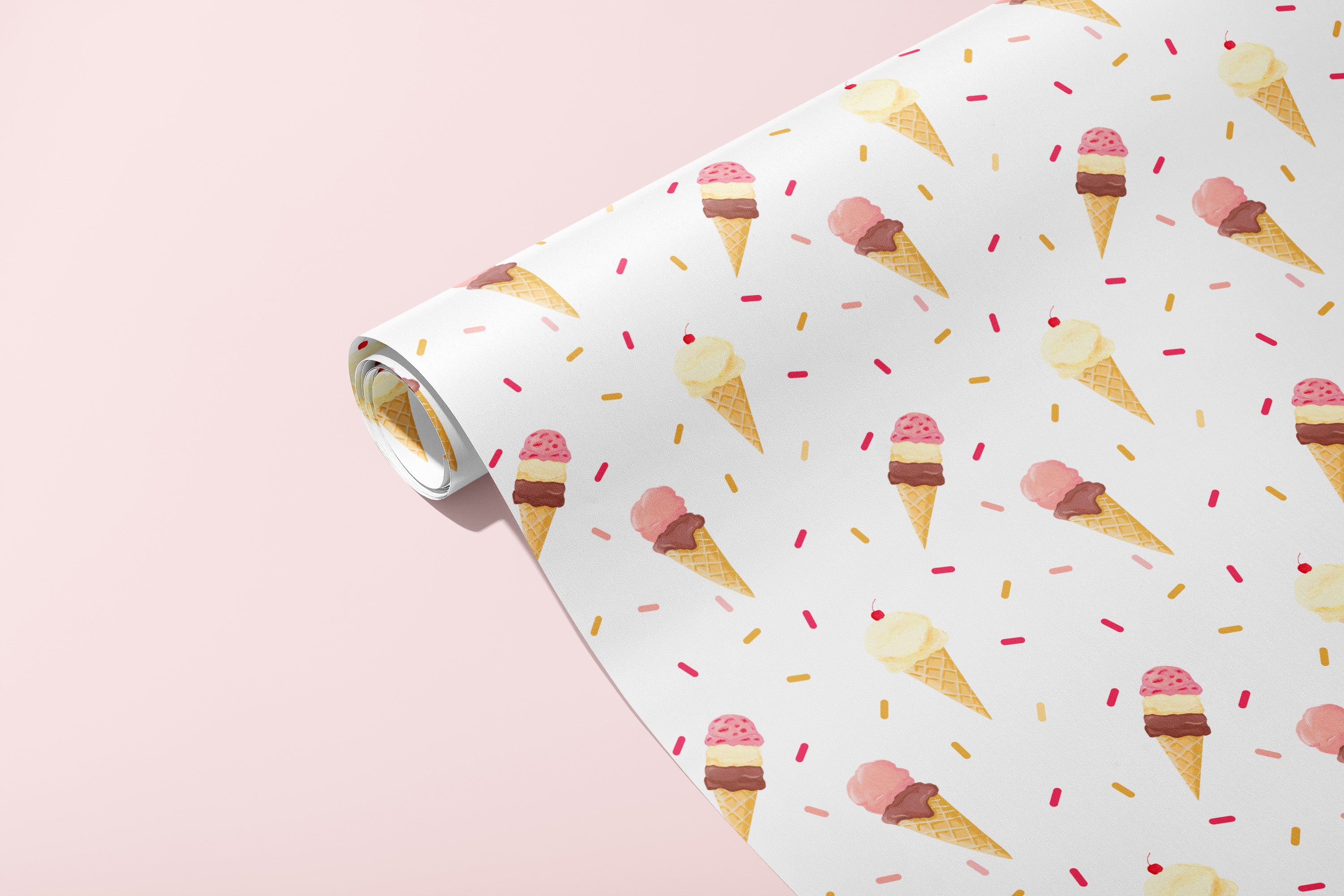 Roll of paper with ice cream cone pattern on a pink background